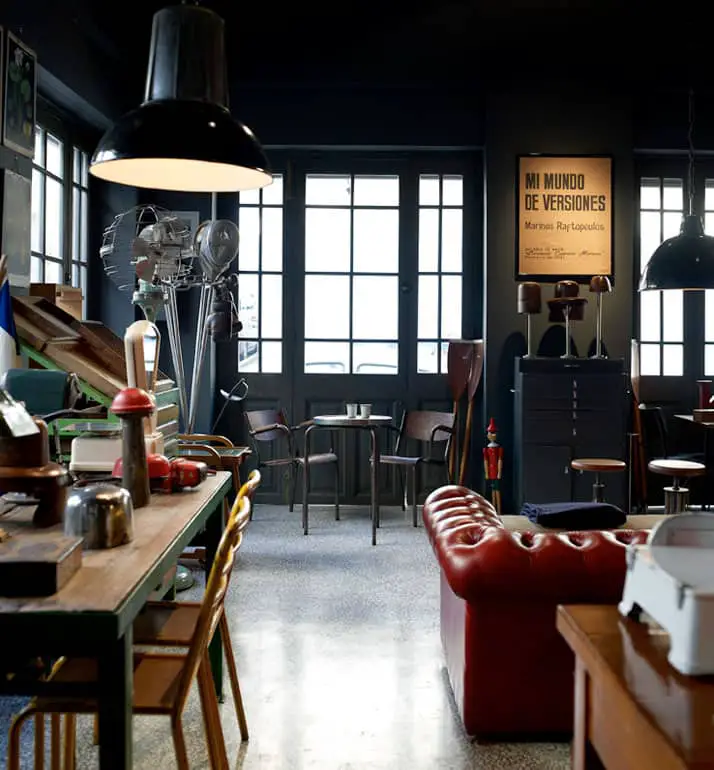 vintage industrial furniture and designer vintage interior by Alketas Pazis: the owner brought together a selection of vintage industrial chairs and tables (wood and metal), a vintage leather couch, vintage industrial lamps and a variety of <a class=