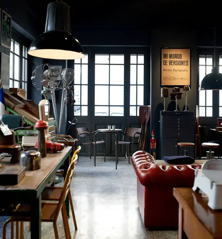retro vintage industrial furniture and designer vintage interior by Alketas Pazis: the owner brought together a selection of vintage industrial chairs and tables (wood and metal), a vintage leather couch, vintage industrial lamps and a variety of <a class=