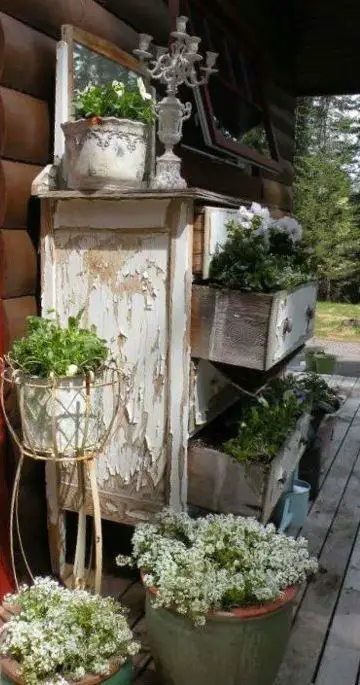 Vintage buffet as fun porch display with plants