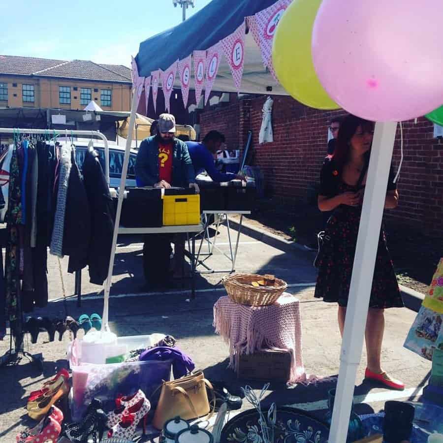 Vinyl records and secondhand books at a stall at Brunswick Flea Market next to Howler Melbourne