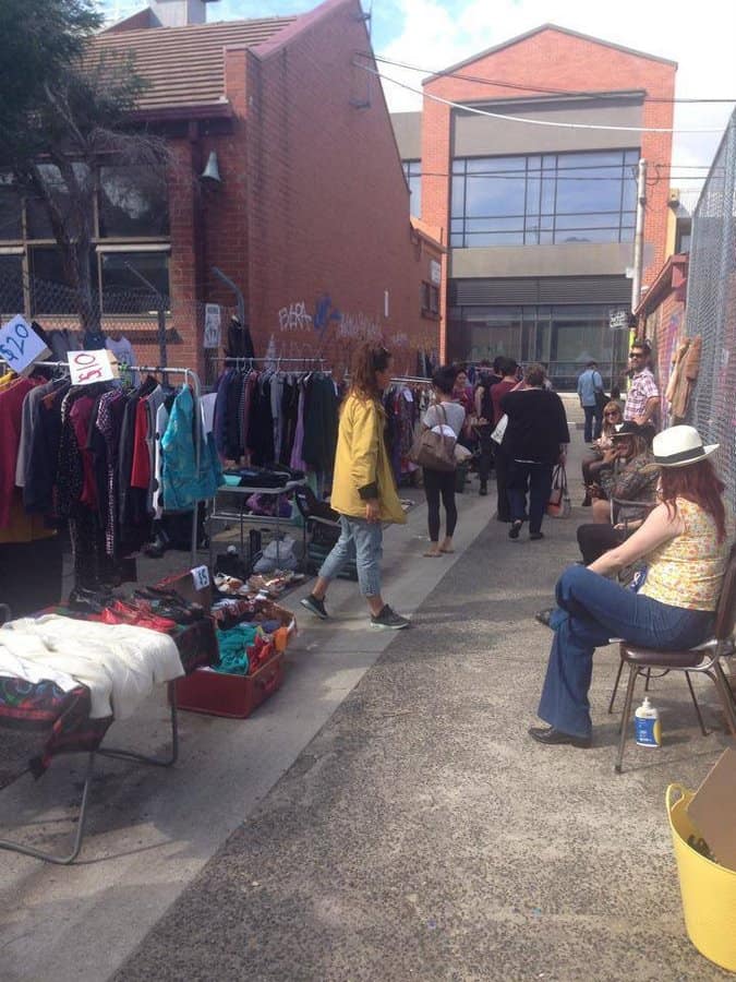 Colourful second-hand shoes bags and clothing at Brunswick Flea Market stalls in Melbourne