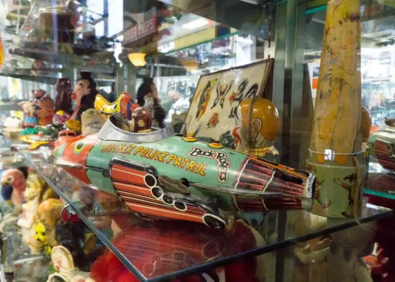 Antiques displayed in a window display at an antique mall